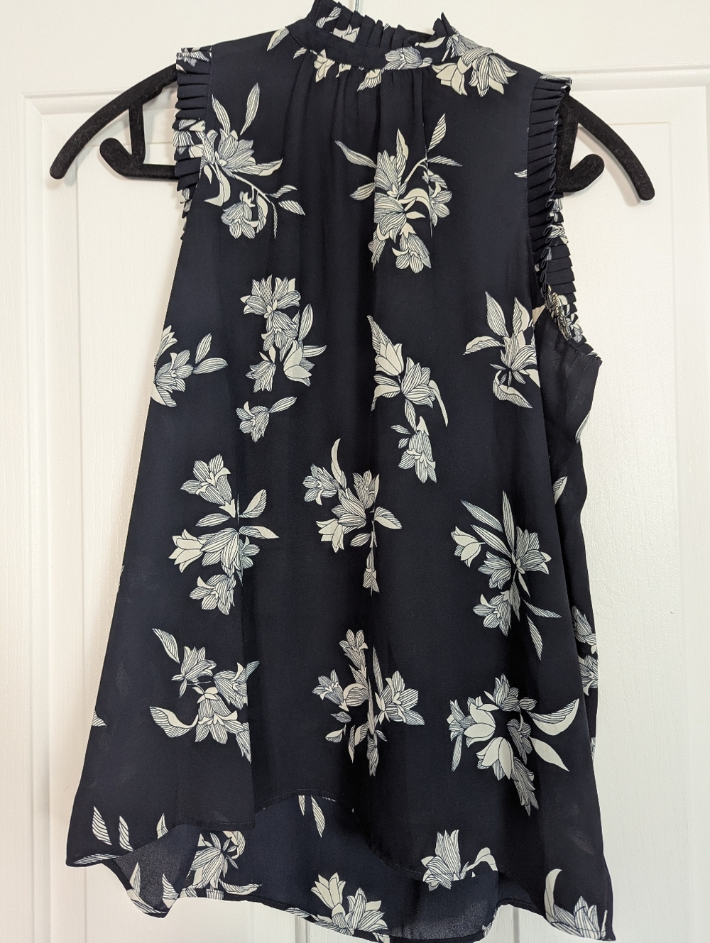 Navy Floral Sleeveless Ruffle Mock Neck Top